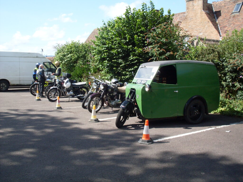 The Handyvan is a three-wheeler from the 1930s, motorcycle front forks with a van body behind! 