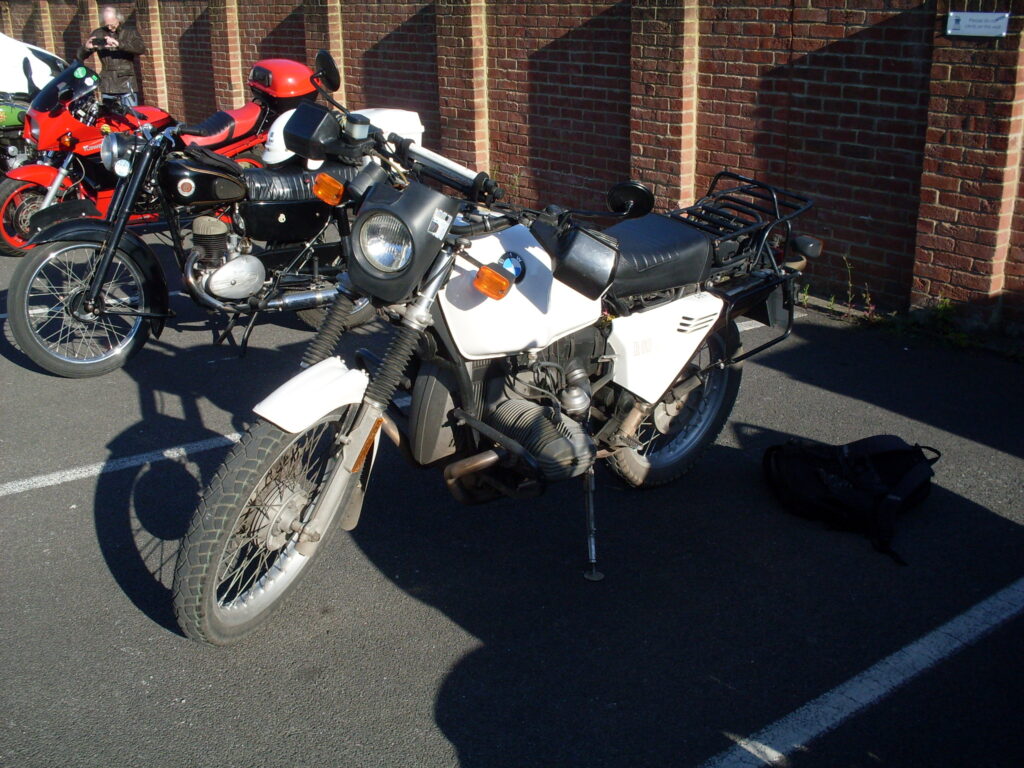 An air-cooled BMW fitted with a very substantial prop stand.